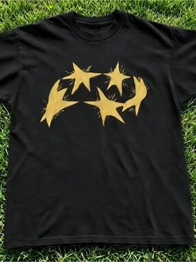Black unisex T-shirt with a distinctive star pattern.
